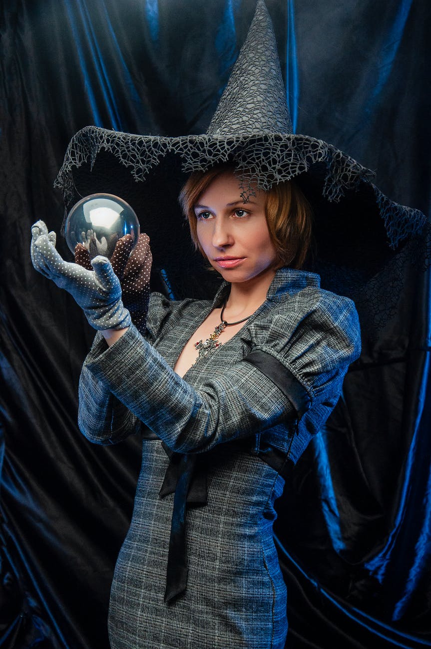 A witch with a crystal ball.