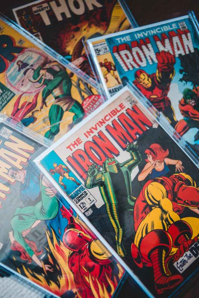 Several comic books in a pile.